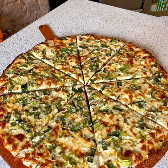 Pizza slice ”Dabrowski Special”.