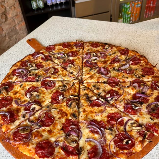 Pizza slice ”New York Supreme”